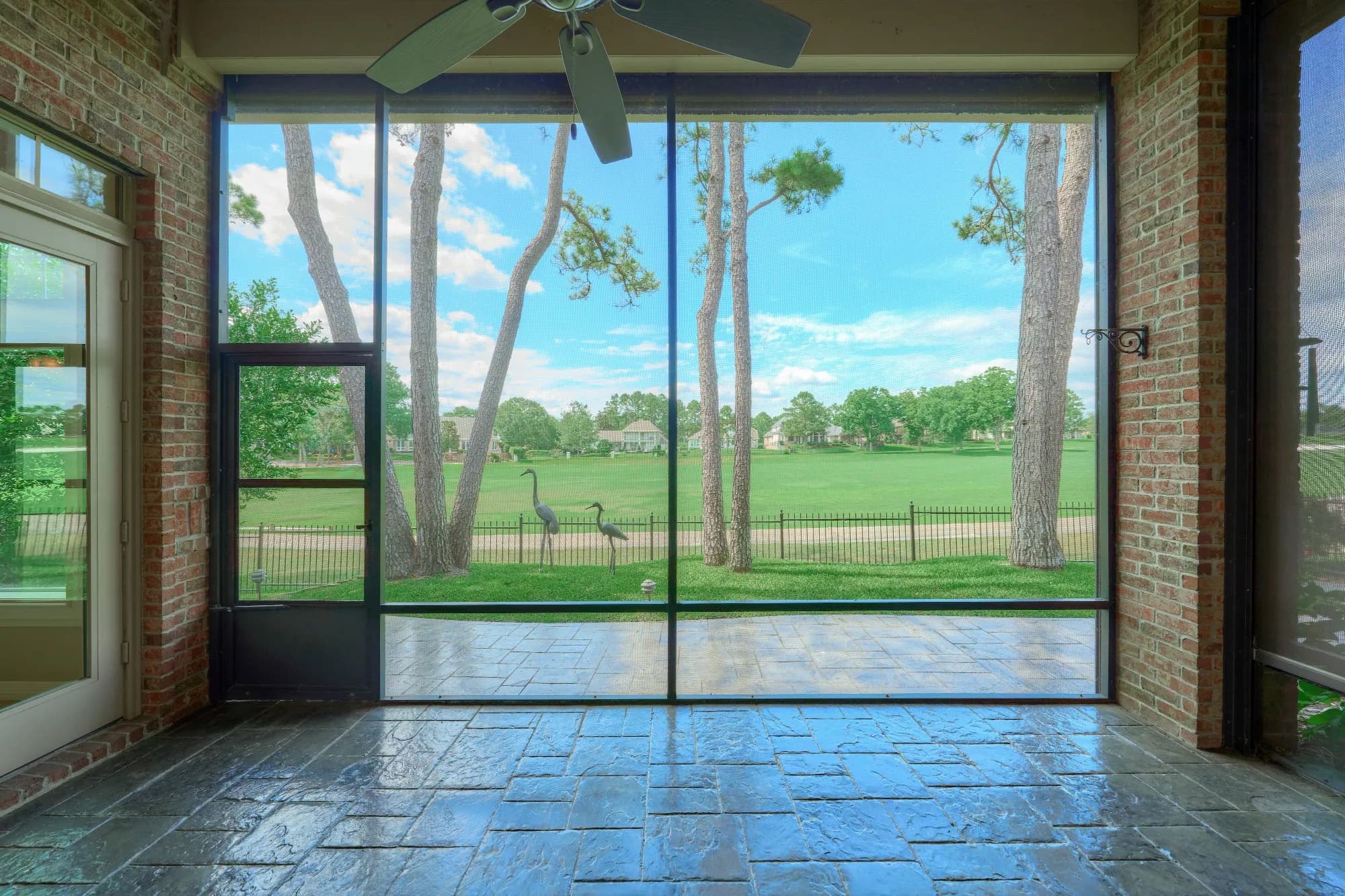 331 Wedgewood Drive, Montgomery, TX – sold home, screened porch overlooking the golf course