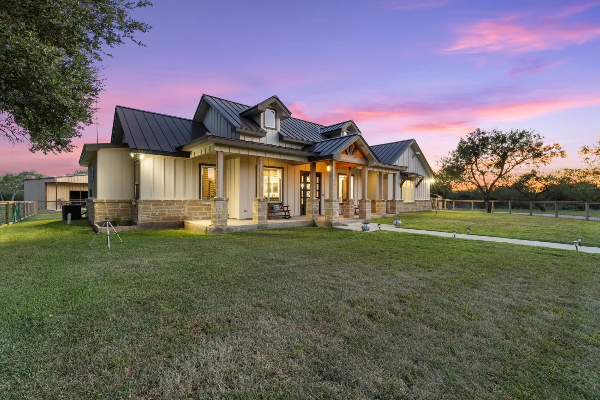 976 County Road 7718, Devine, TX – sold home, front of the house at dusk
