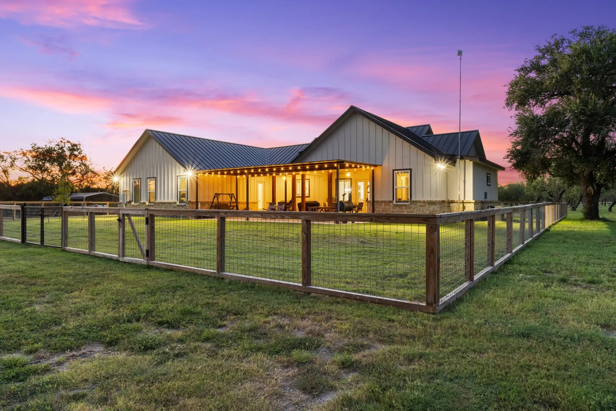 976 County Road 7718, Devine, TX – sold home, covered porch and fenced yard
